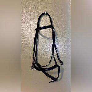 Showman leather English bridle with leather braided reins brand new never used.